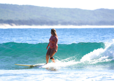 Female surfing at Agnes Water